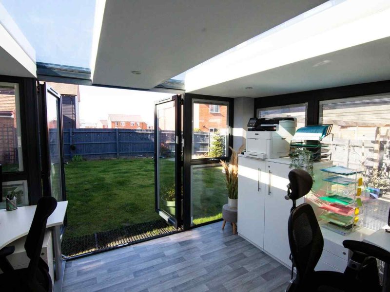 Garden room used as office with double doors