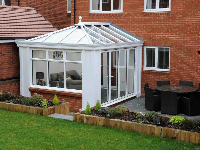 Glass roof conservatory with glass walls, dwarf wall and super insulated columns